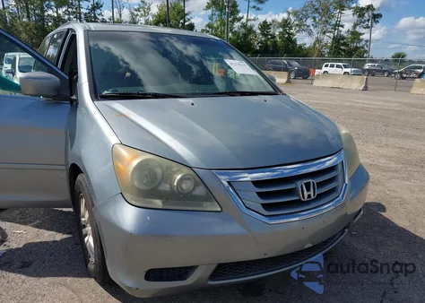 2010 Honda Odyssey Ex-L z USA, uszkodzony, nr VIN 5FNRL3H63AB011747